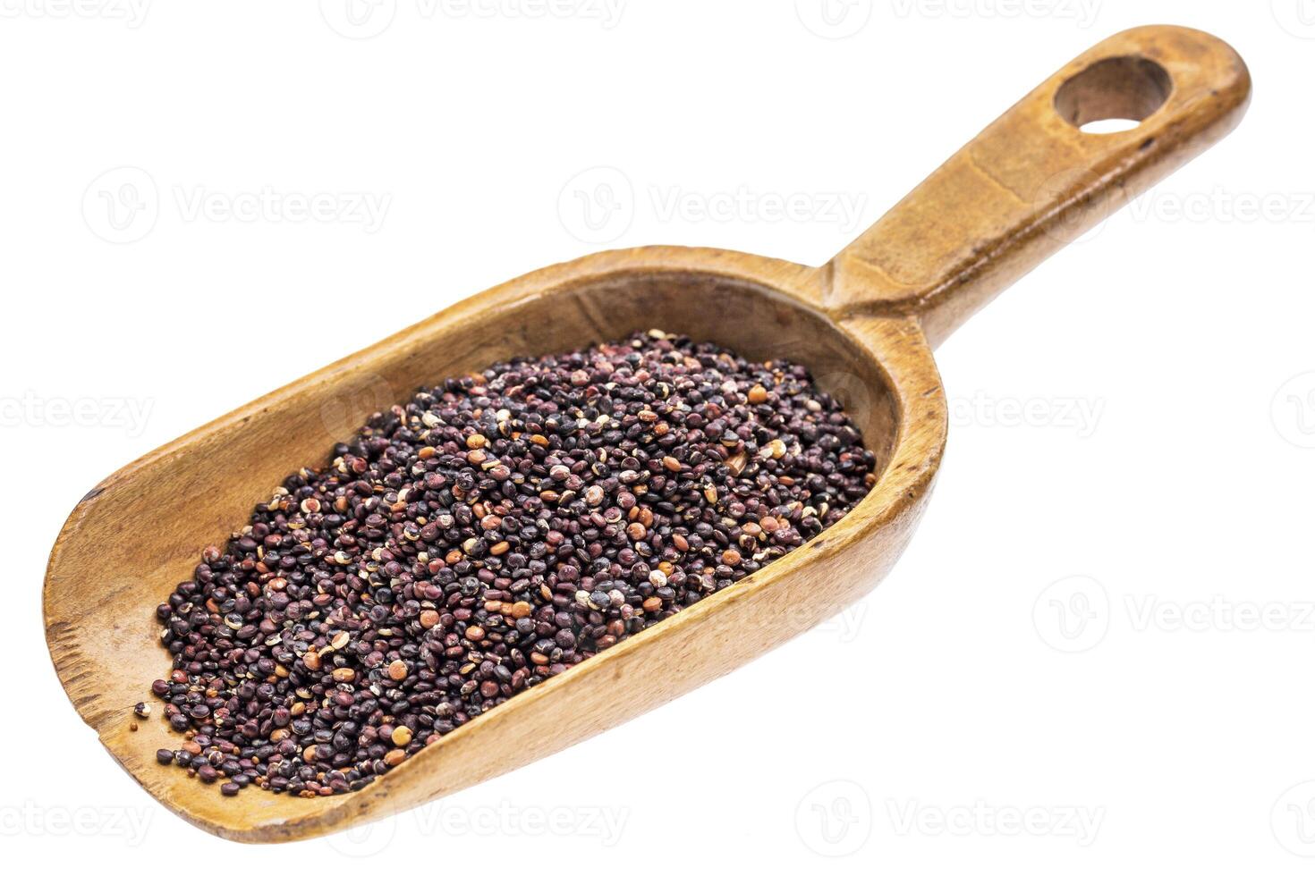 rustic scoop of black quinoa grain photo