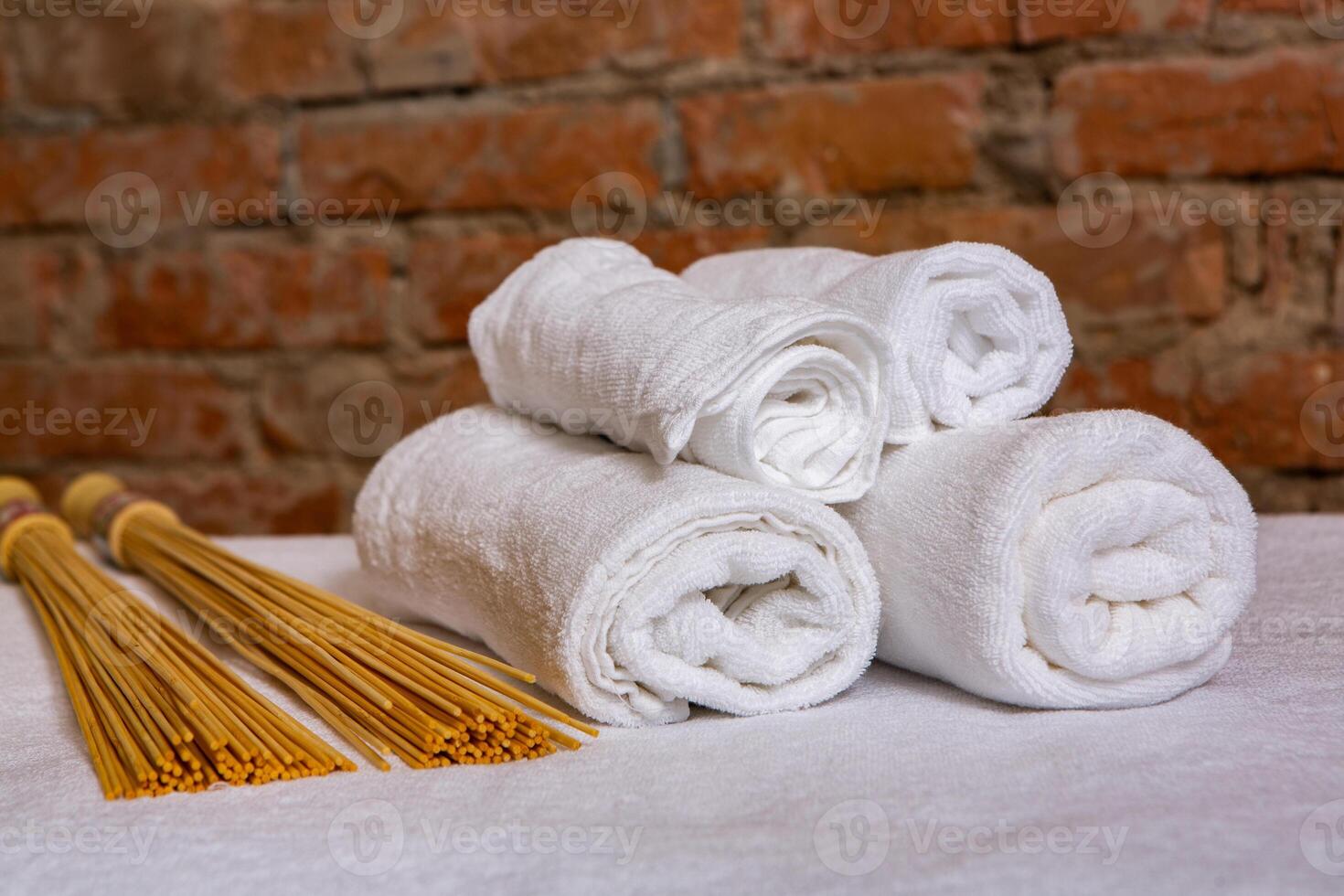 Beautiful spa composition on massage table in wellness center photo