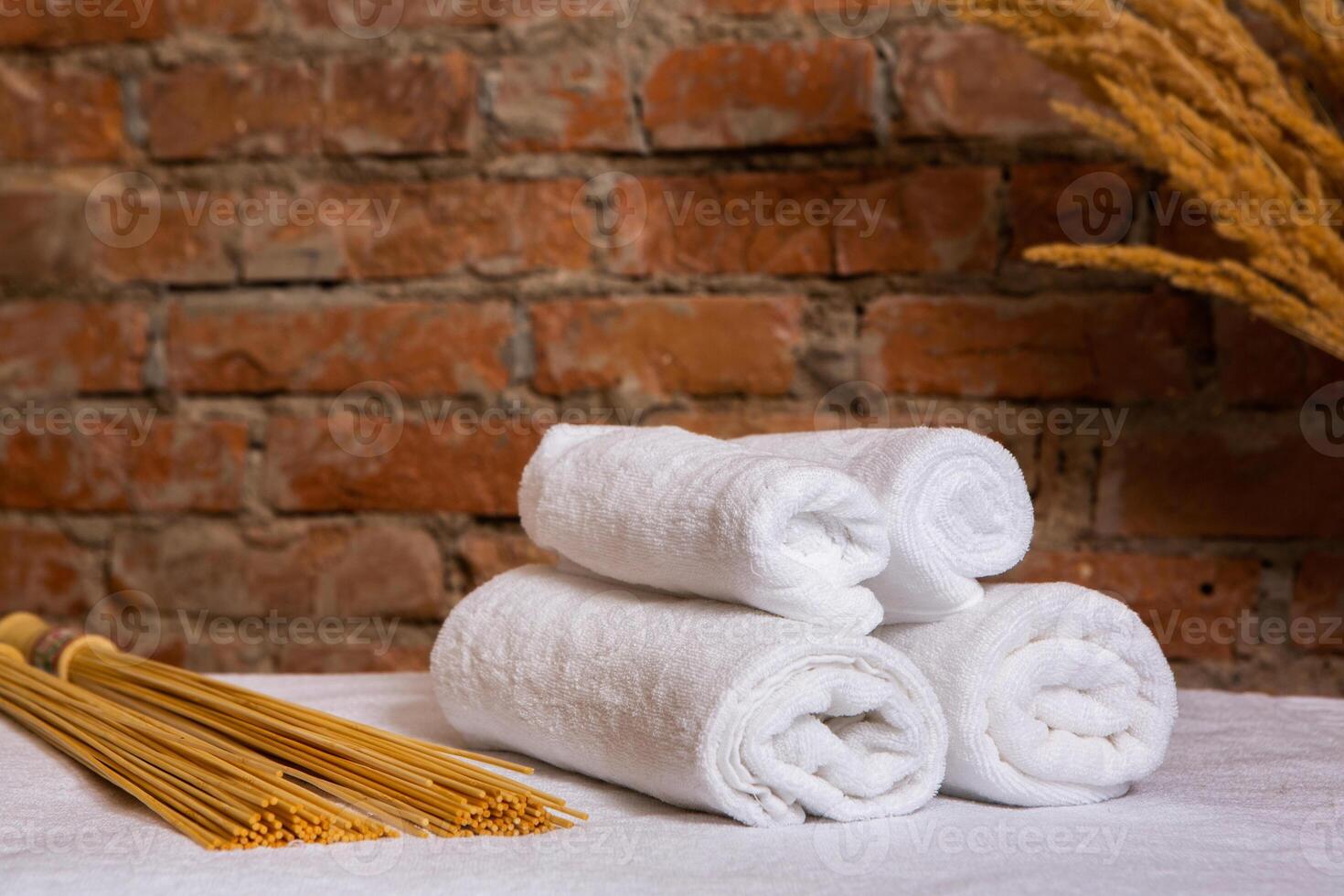 Beautiful spa composition on massage table in wellness center photo