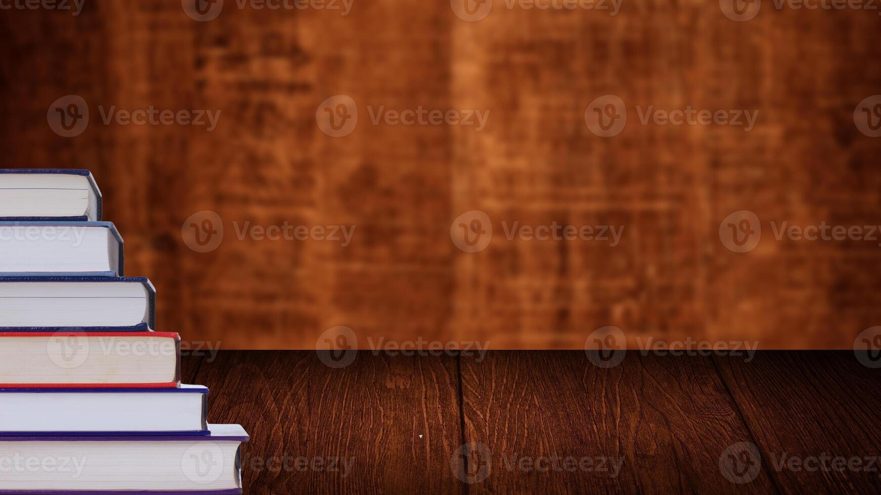 World book day. Stack of colorful books with open book on teal background. Education photo