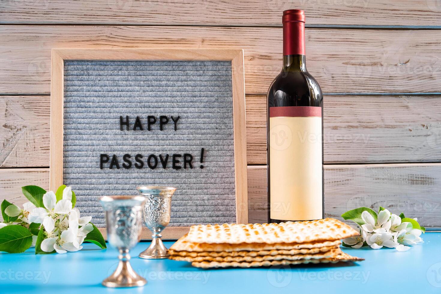 Celebrating spring holiday Passover. Bottle of wine and traditional Jewish matzo bread photo