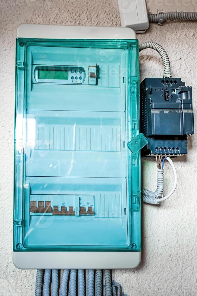 Large electrical distribution panel on the wall. photo
