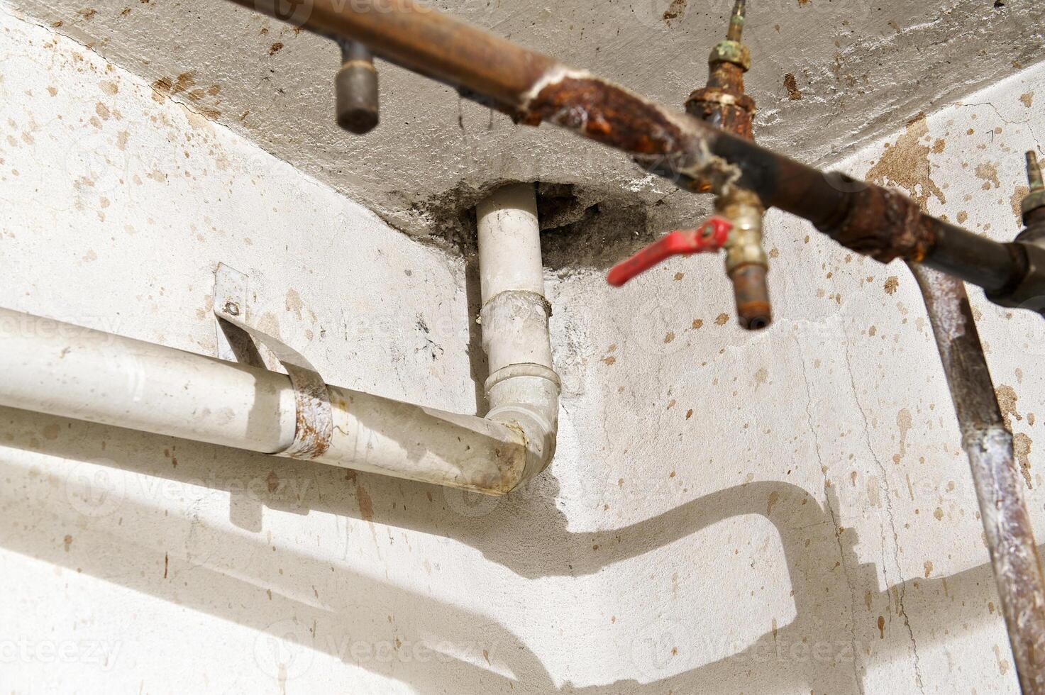 Old pipes in a basement photo