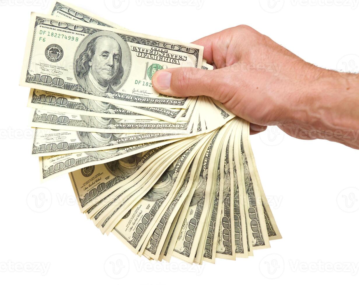 American dollars arranged in stacks of 100 bills each photo