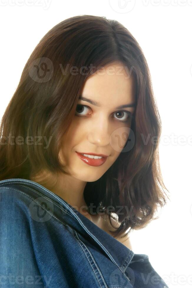 A portrait of a young woman in the studio photo