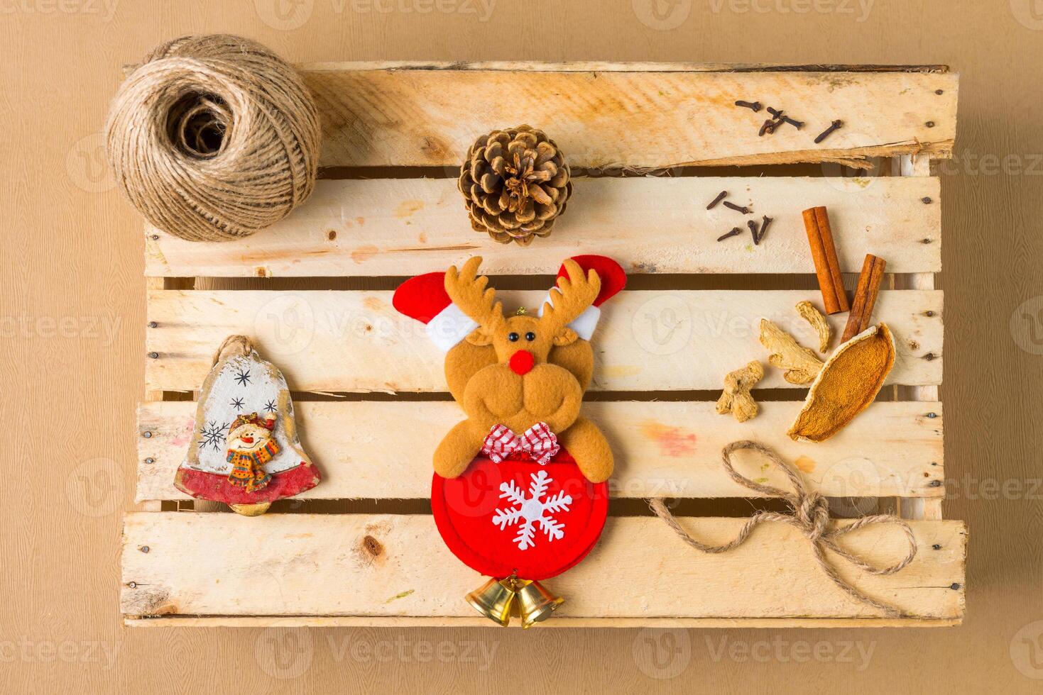 Christmas deer over wooden table photo