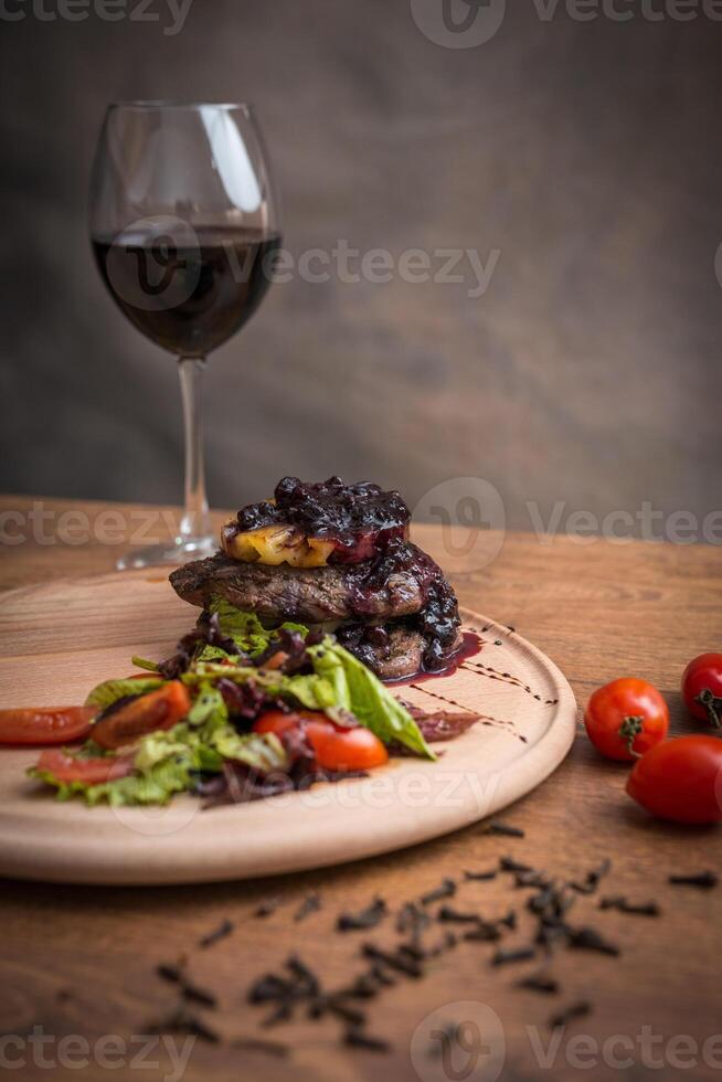 Steak on serving plate photo