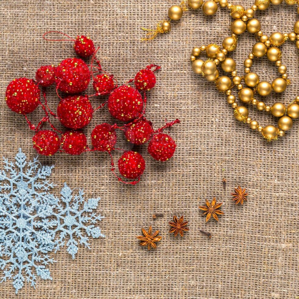 Christmas toy on natural sackcloth background photo