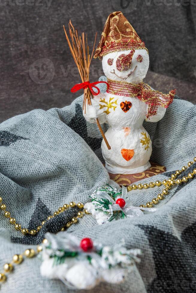 Happy snowman on a colored background photo