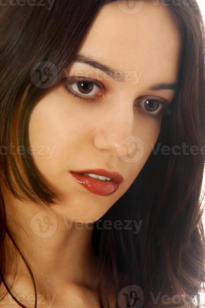 A portrait of a young woman in the studio photo