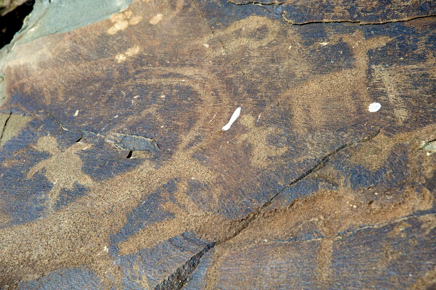 Petroglyphs within the Archaeological Landscape of Tamgaly. Almaty area, Kazakhstan photo
