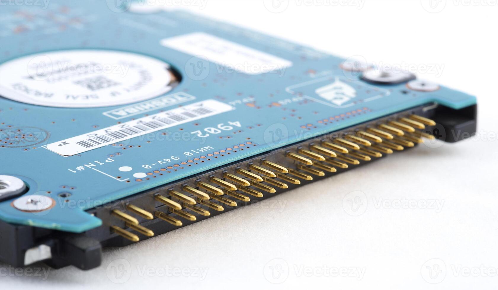 Close-up inside view of hard disk isolated on white background photo