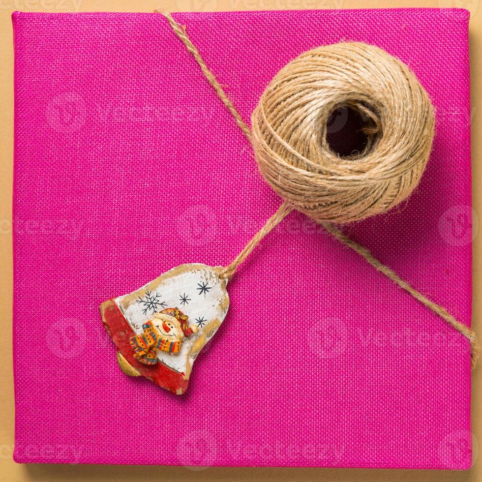 Christmas bells on a color background photo