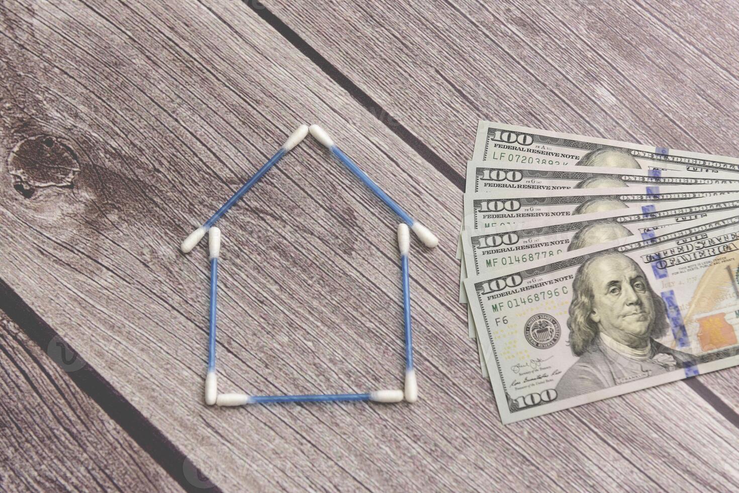 Real estate business,buy house, concept of savings in dollars photo