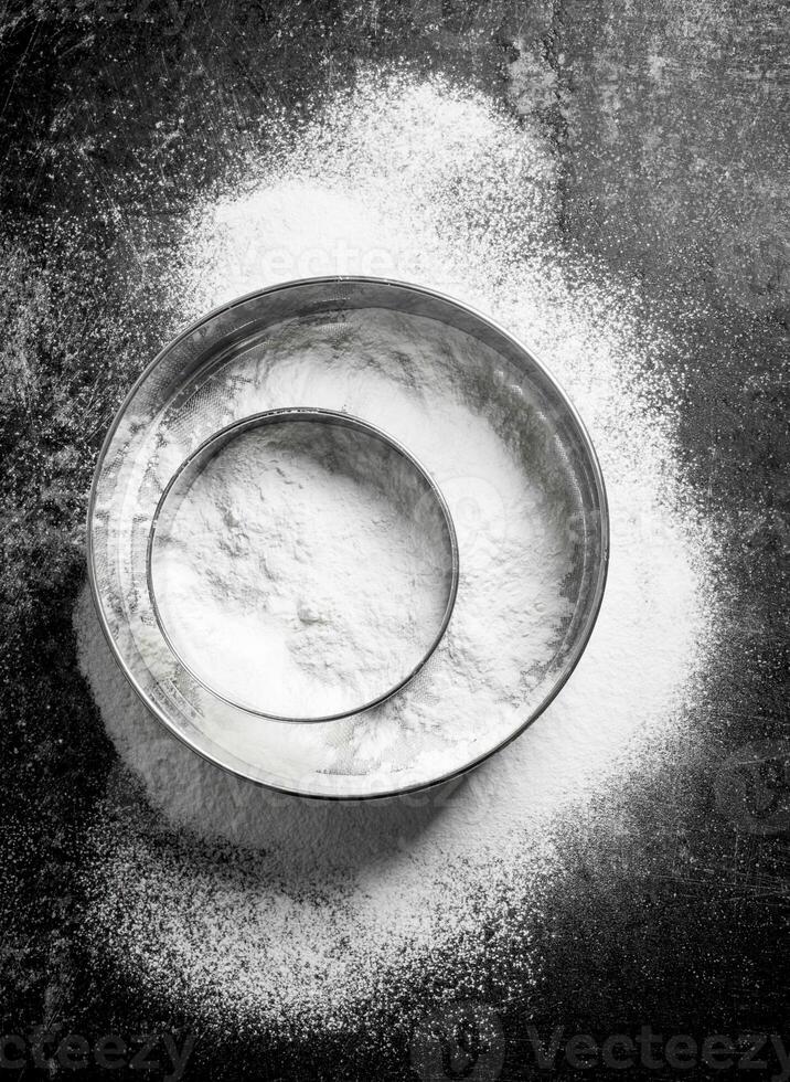 Flour with different sieves. photo