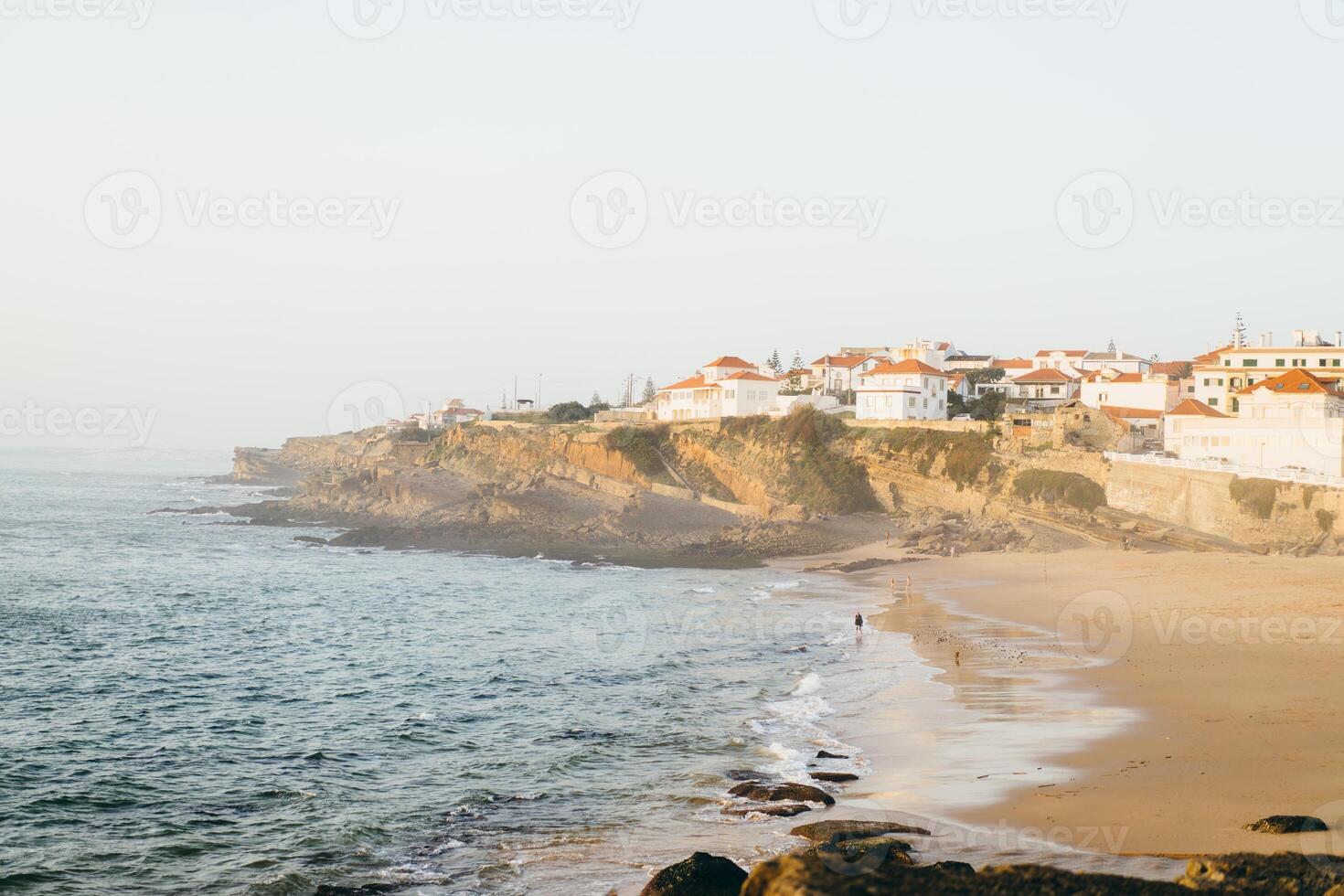 Praia das Macas Apple Beach in Colares, Portugal, on a stormy day before sunset photo