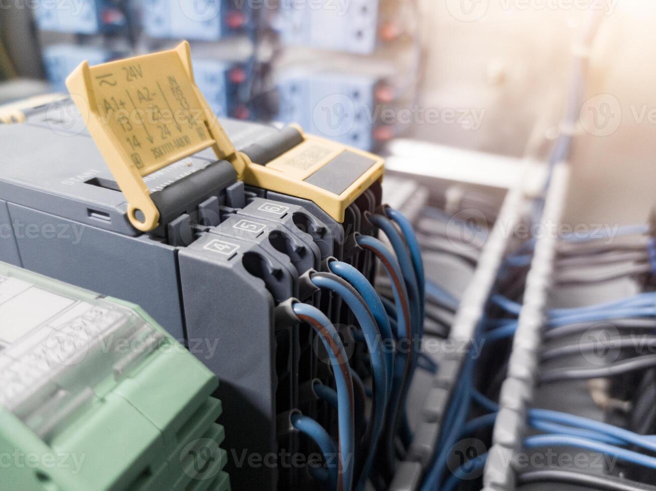 Terminal connection relay control, automatic relay control on the panel board manchinery, electrical service concept, electrical background. photo