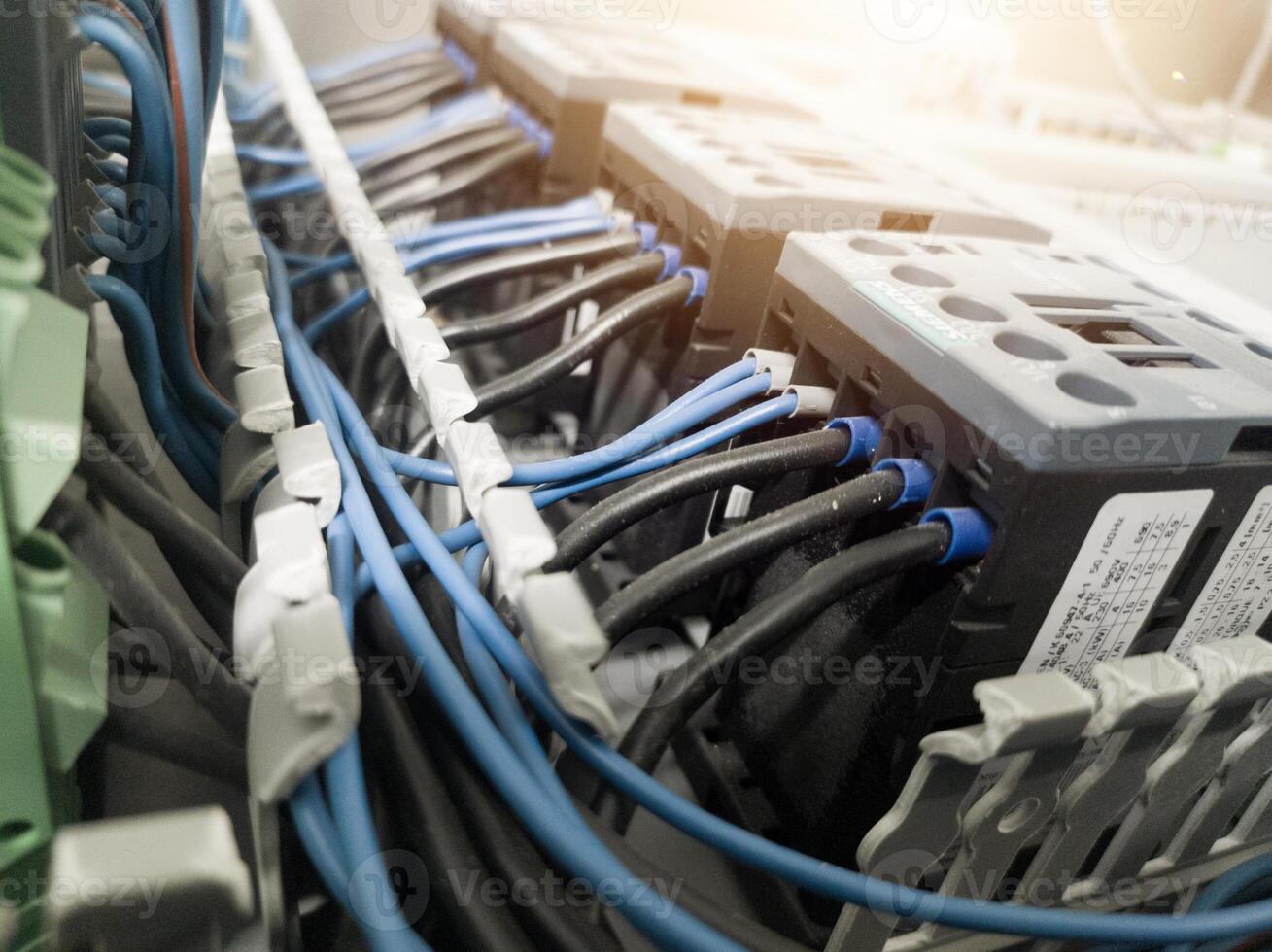 Terminal connection relay control, automatic relay control on the panel board manchinery, electrical service concept, electrical background. photo