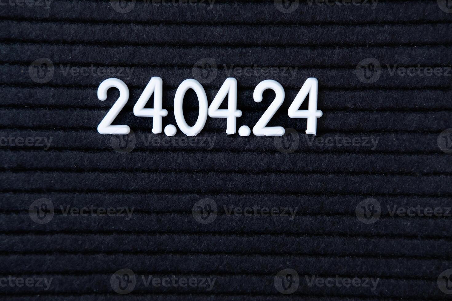 Beautiful date for a wedding 04.24.2024 on a lettoboard on a black background photo