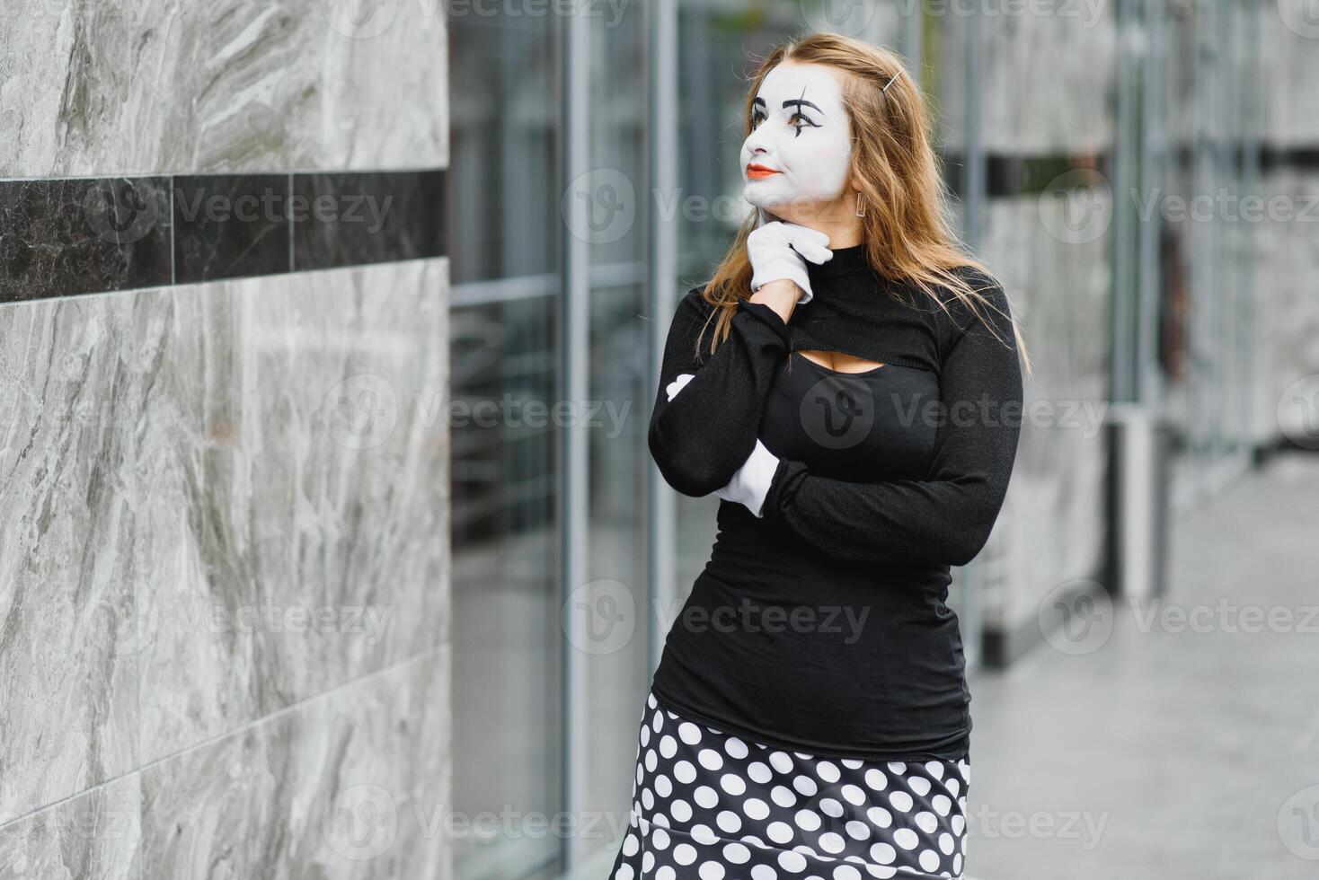 The girl with makeup of the mime. improvisation. photo