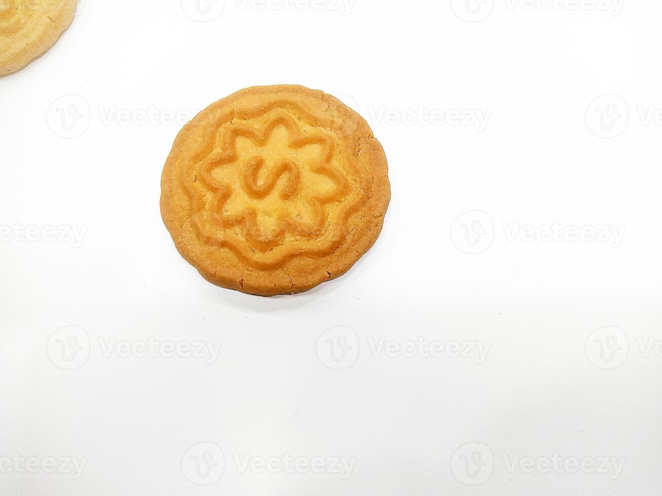 Wheat biscuits BISCUITS - A stack of delicious wheat round biscuits with a few crumbs isolated on white photo