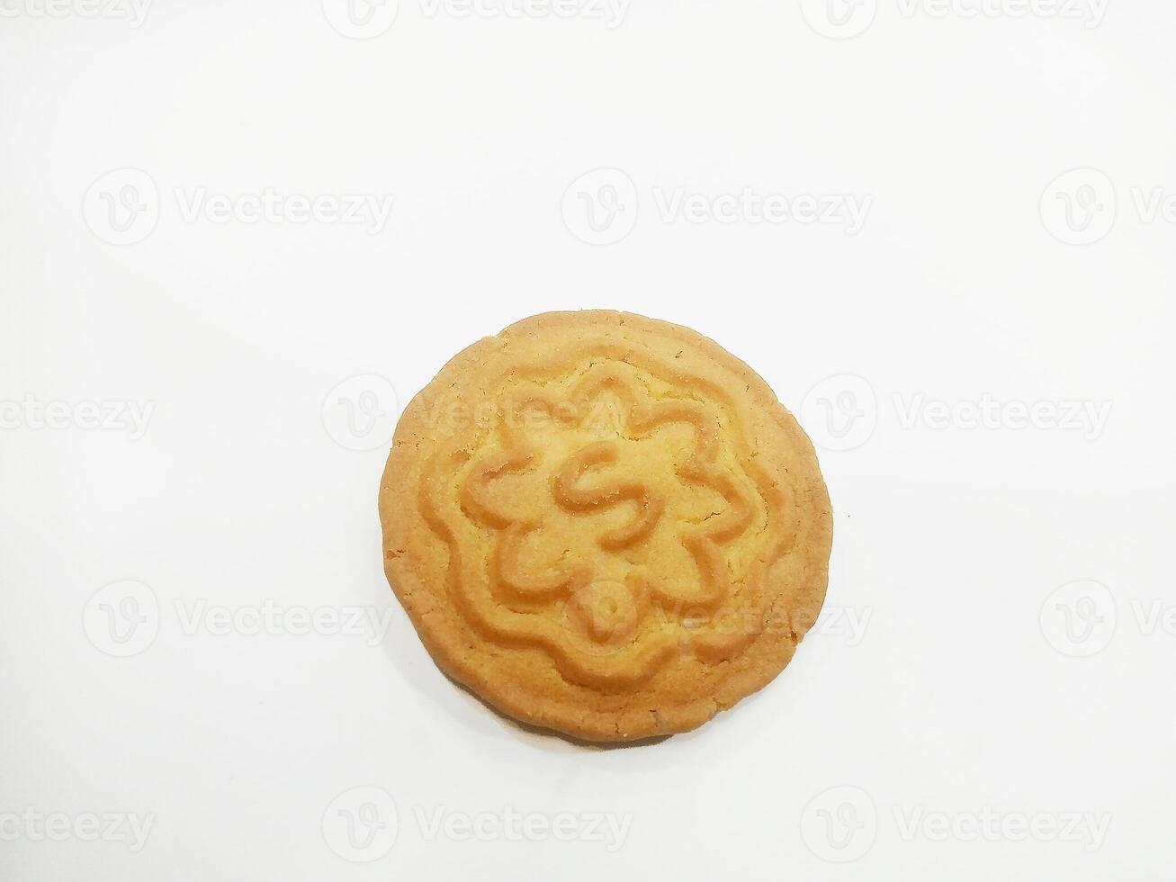 Wheat biscuits BISCUITS - A stack of delicious wheat round biscuits with a few crumbs isolated on white photo