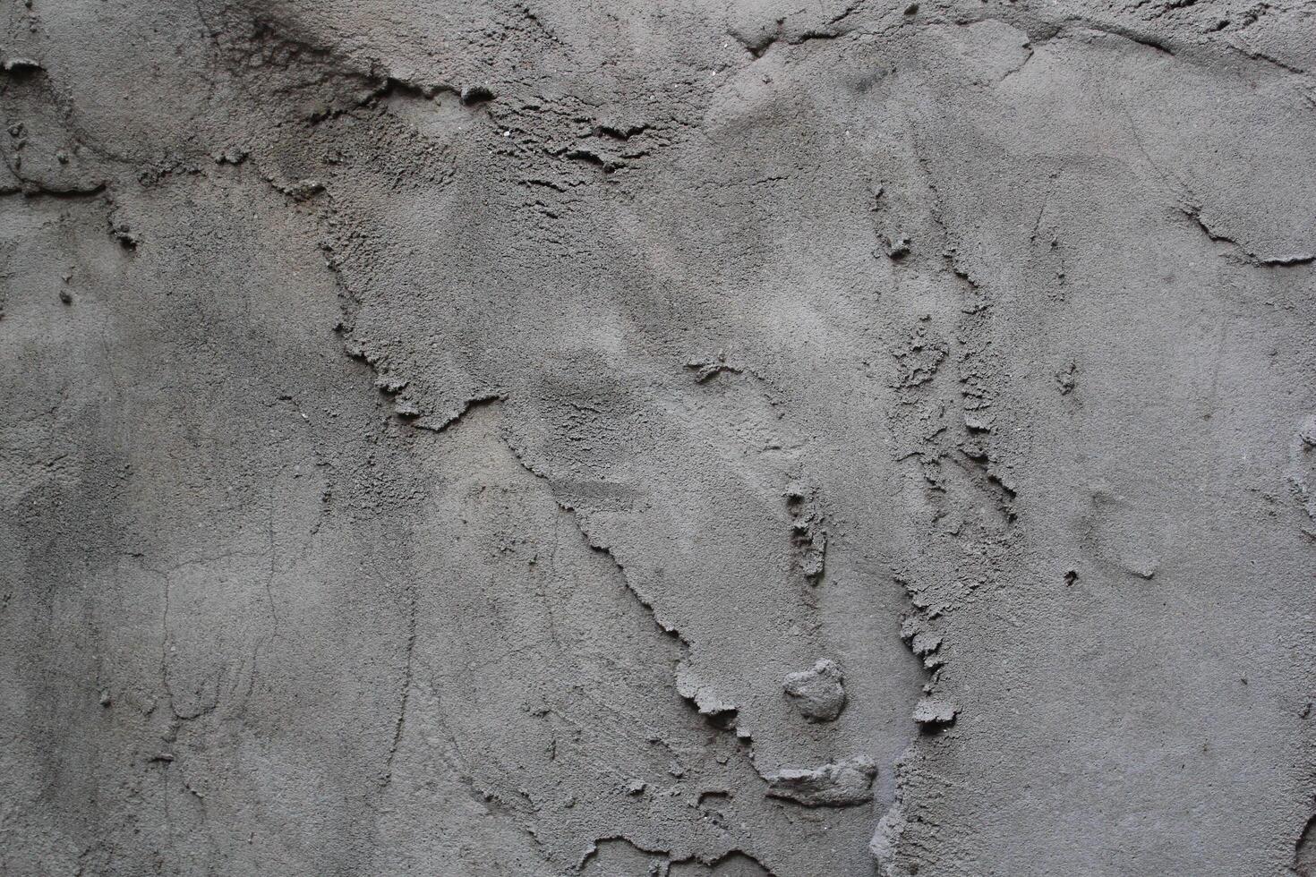 Uneven cement and sand wall texture background, grungy cement wall surface, rustic sand wall photo