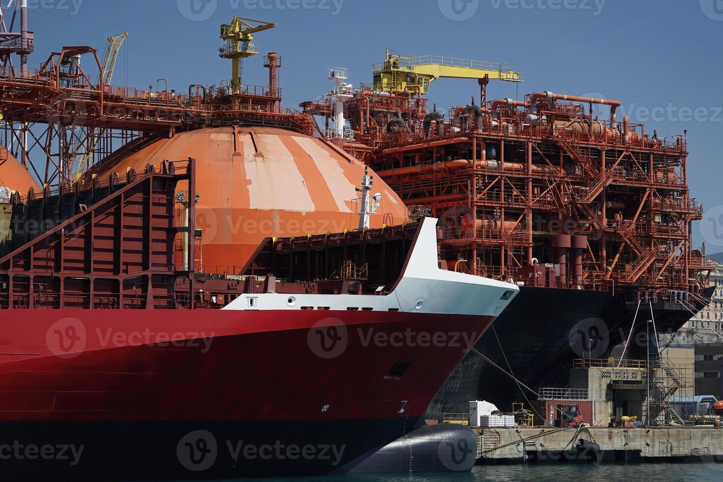 regasifier ship LNG Liquified Natural Gas tanker anchored in Genoa Harbor, Italy photo