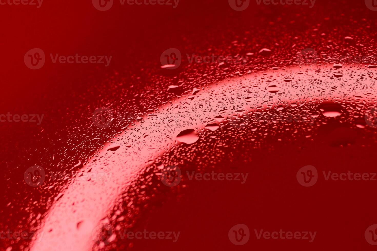 Pattern of droplet on red light illuminated glass surface. Stock Photo For Blood Cells Illustration