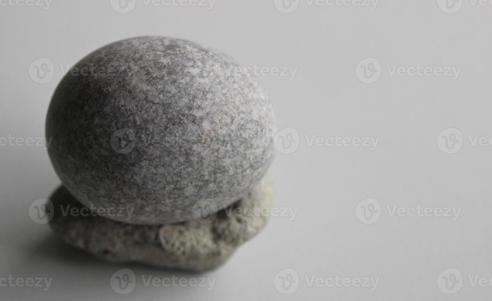 Single Zen Stone On White Surface At A Side Of Image Stock Photo For Backgrounds