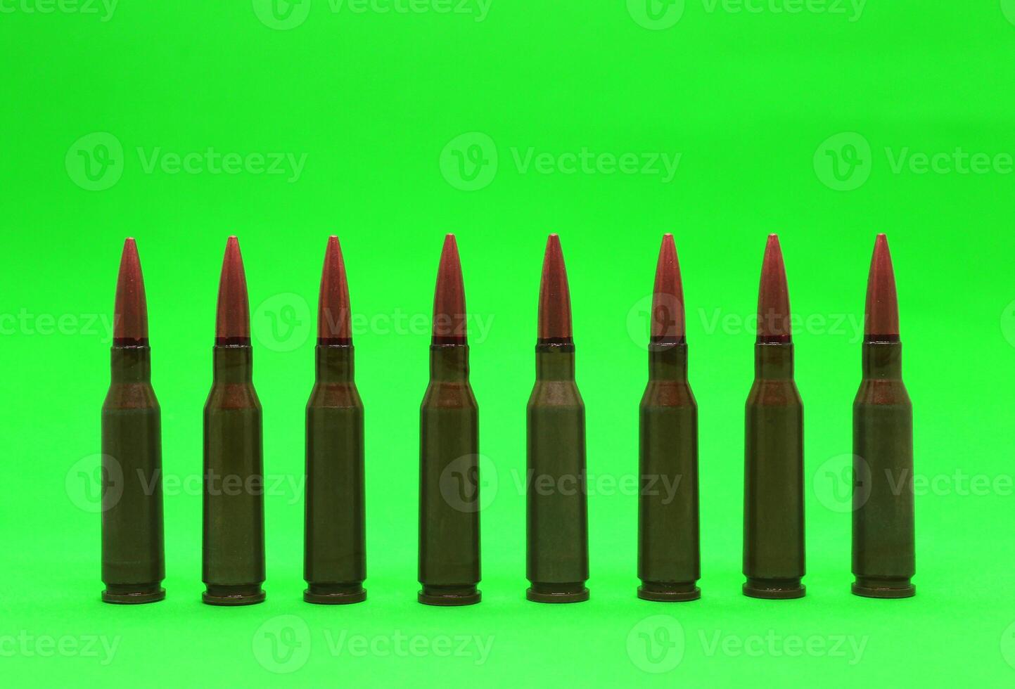 Bullets In A Row Isolated On Green Screen Stock Photo