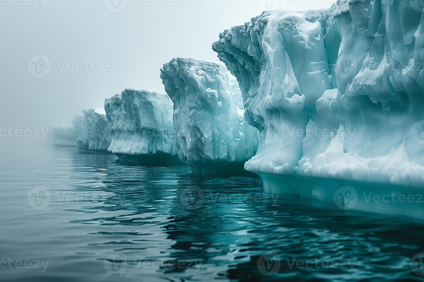 Icebergs floating in a glacial lagoon photo