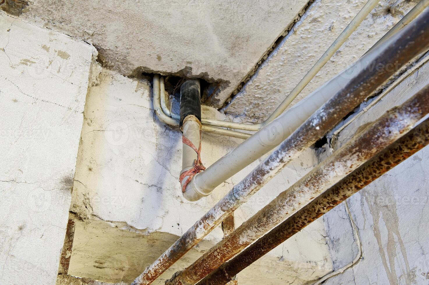 Old pipes in a basement photo