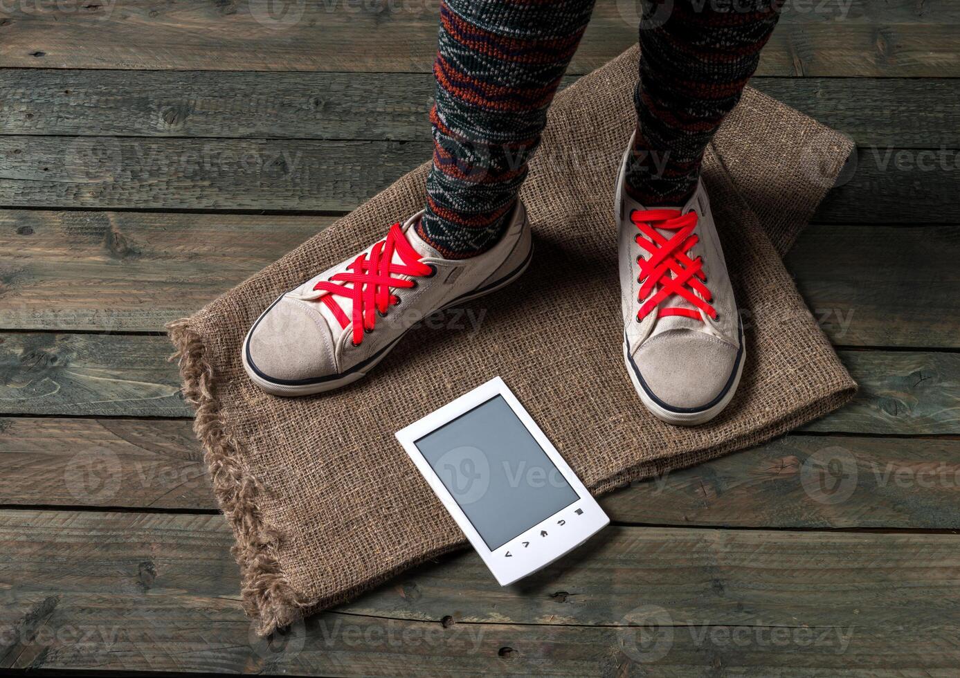 Color socks on a wooden floor photo