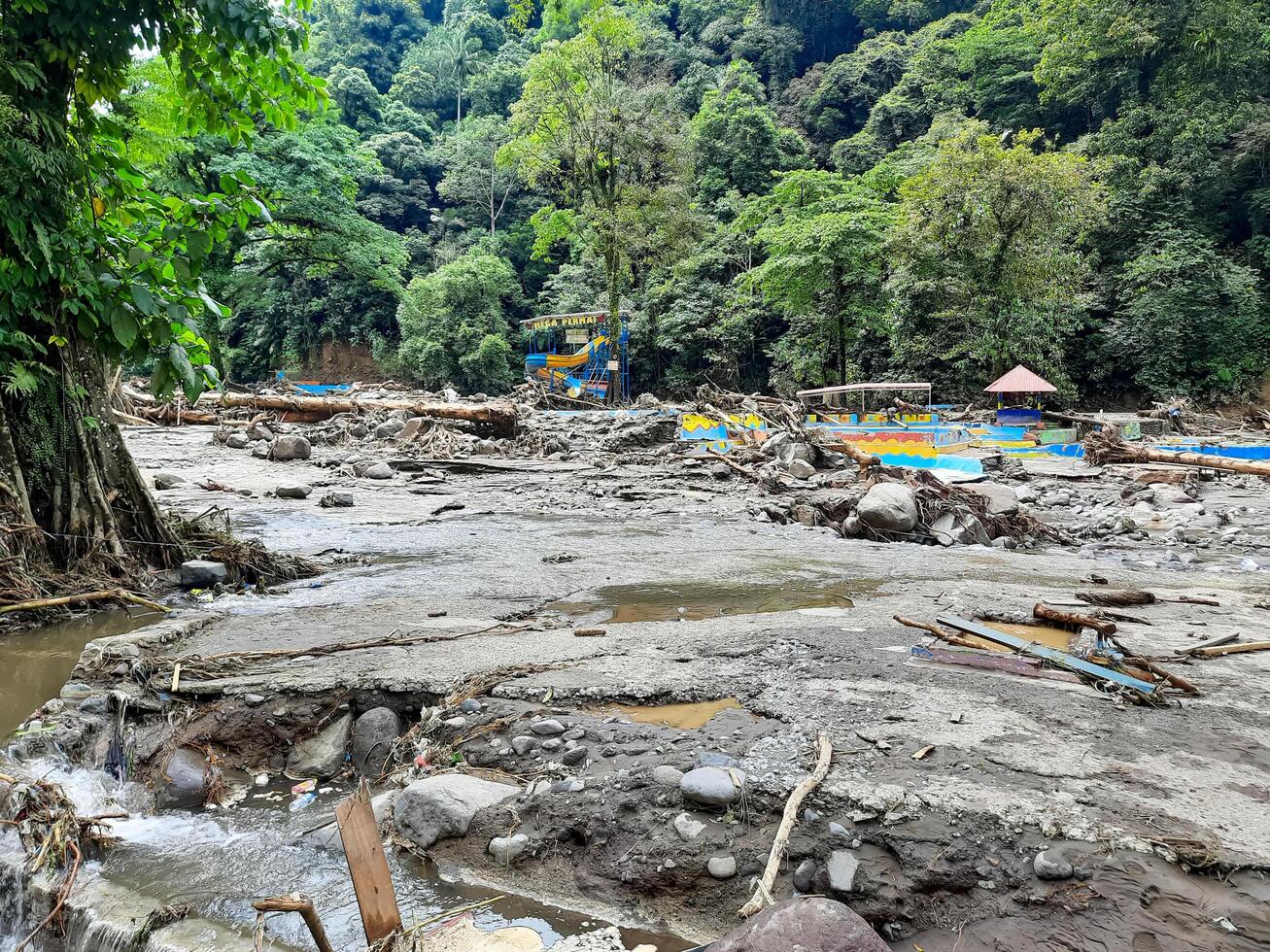 Tanah Datar, Indonesia - May 12, 2024. condition of the Mega Mendung water park which was affected by cold lava flash floods, natural disasters in Lembah Anai photo