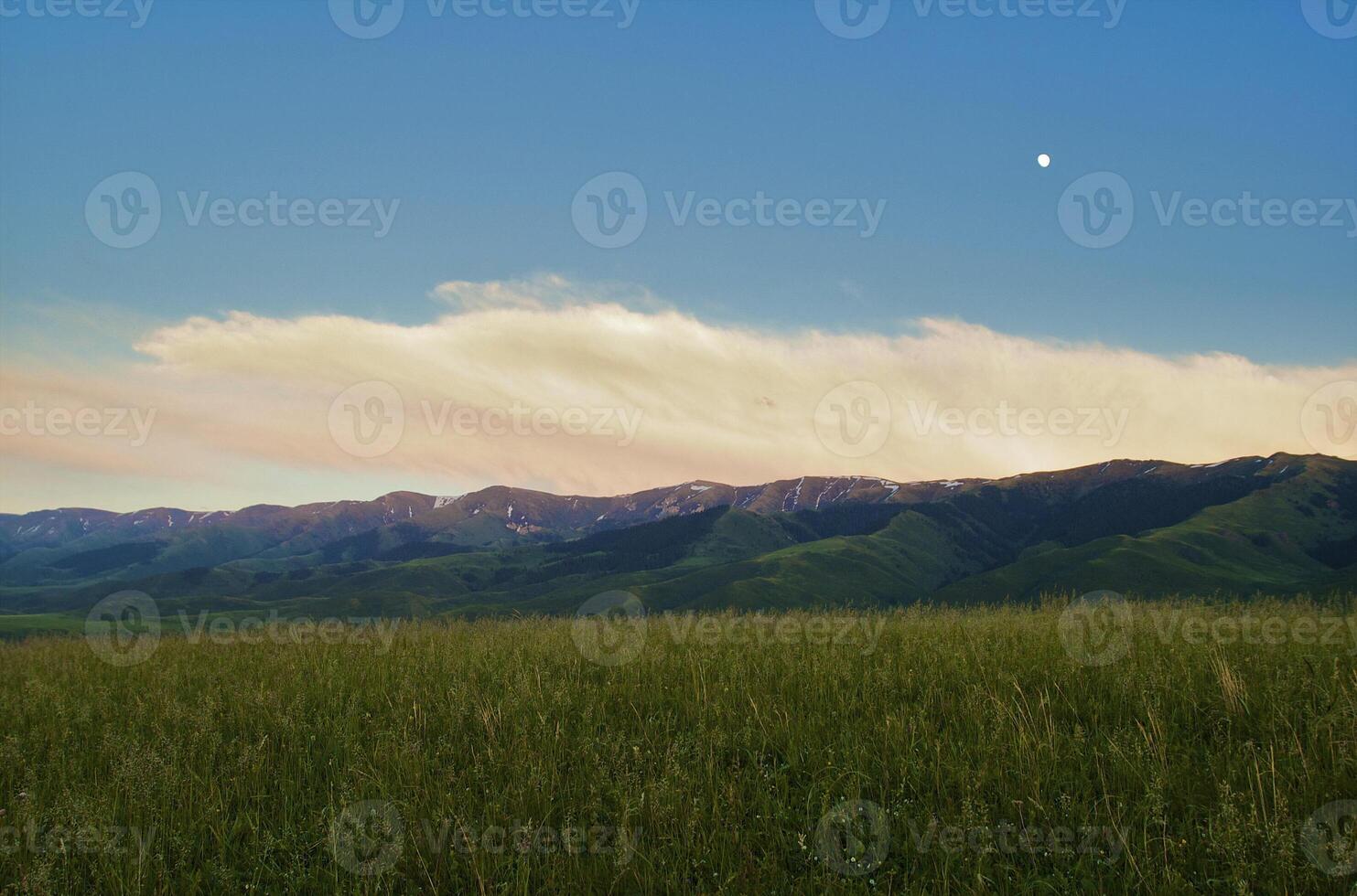 Beautiful view of valley with the mountains photo