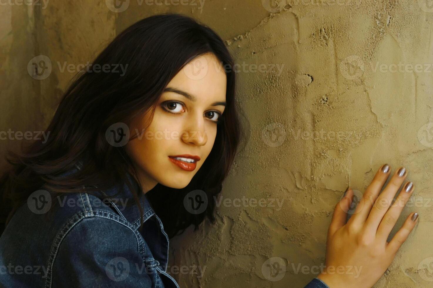 A portrait of a young woman in the studio photo