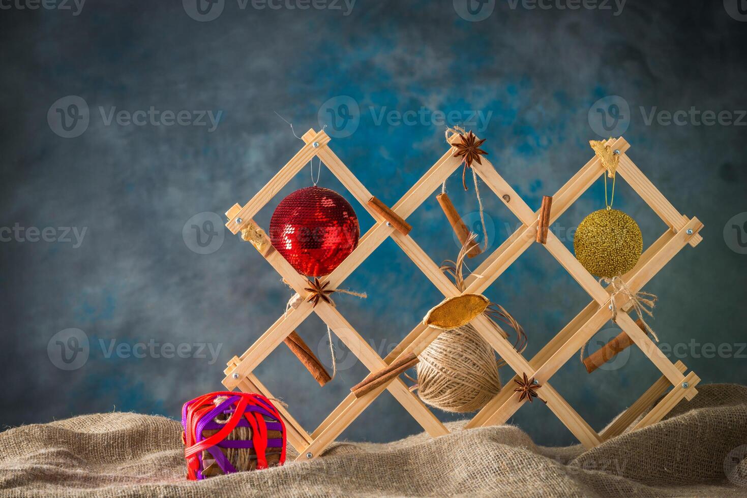 Christmas toy on natural sackcloth background photo