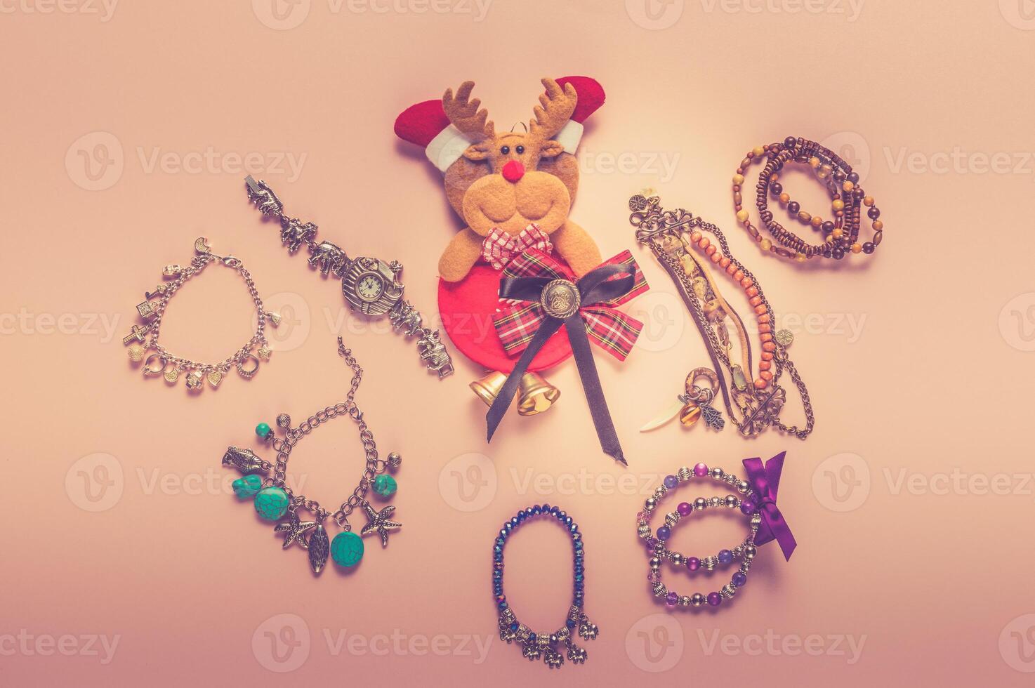 Set of natural material necklaces on pink background photo