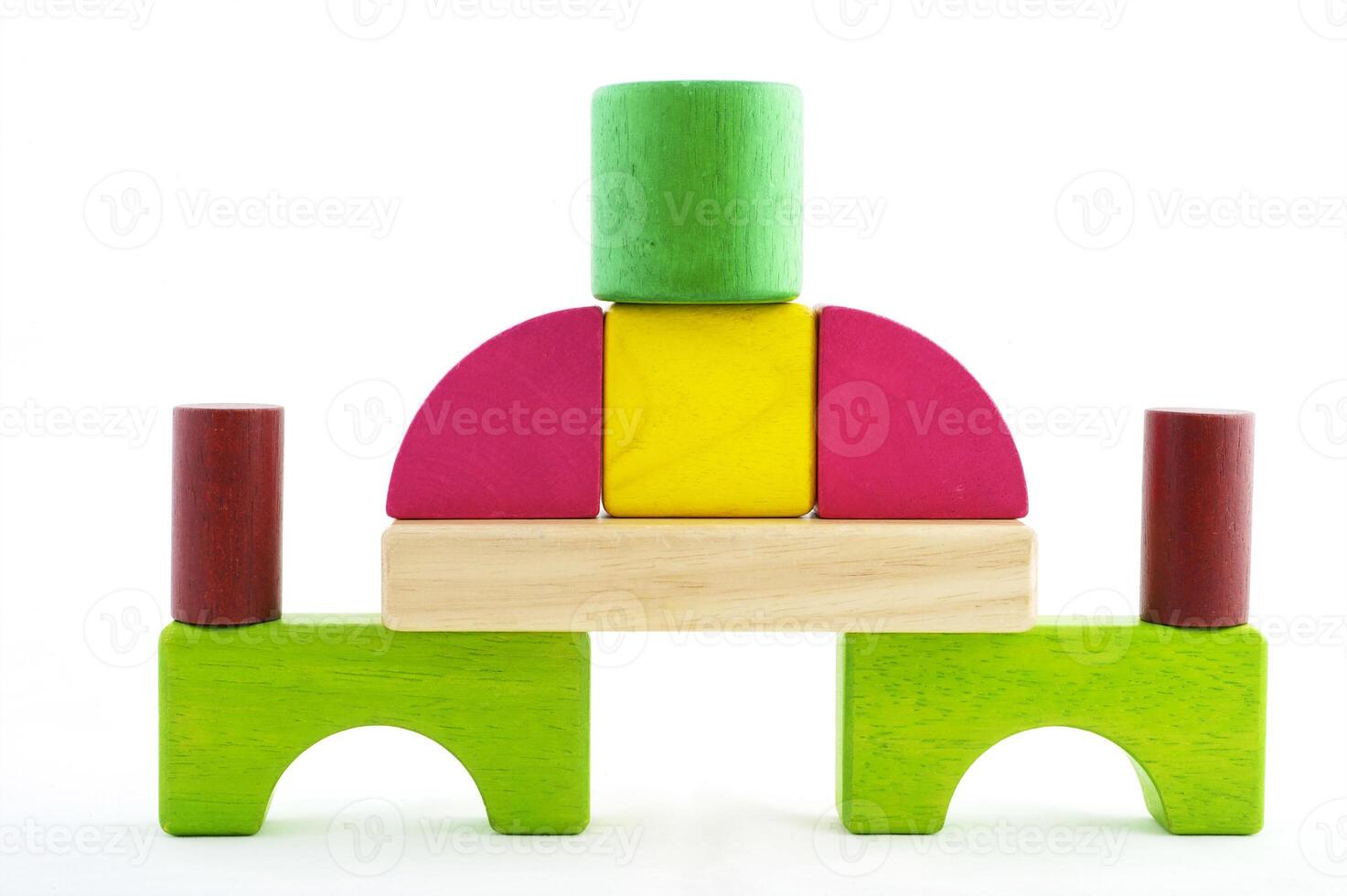 Wooden toy blocks on white background photo