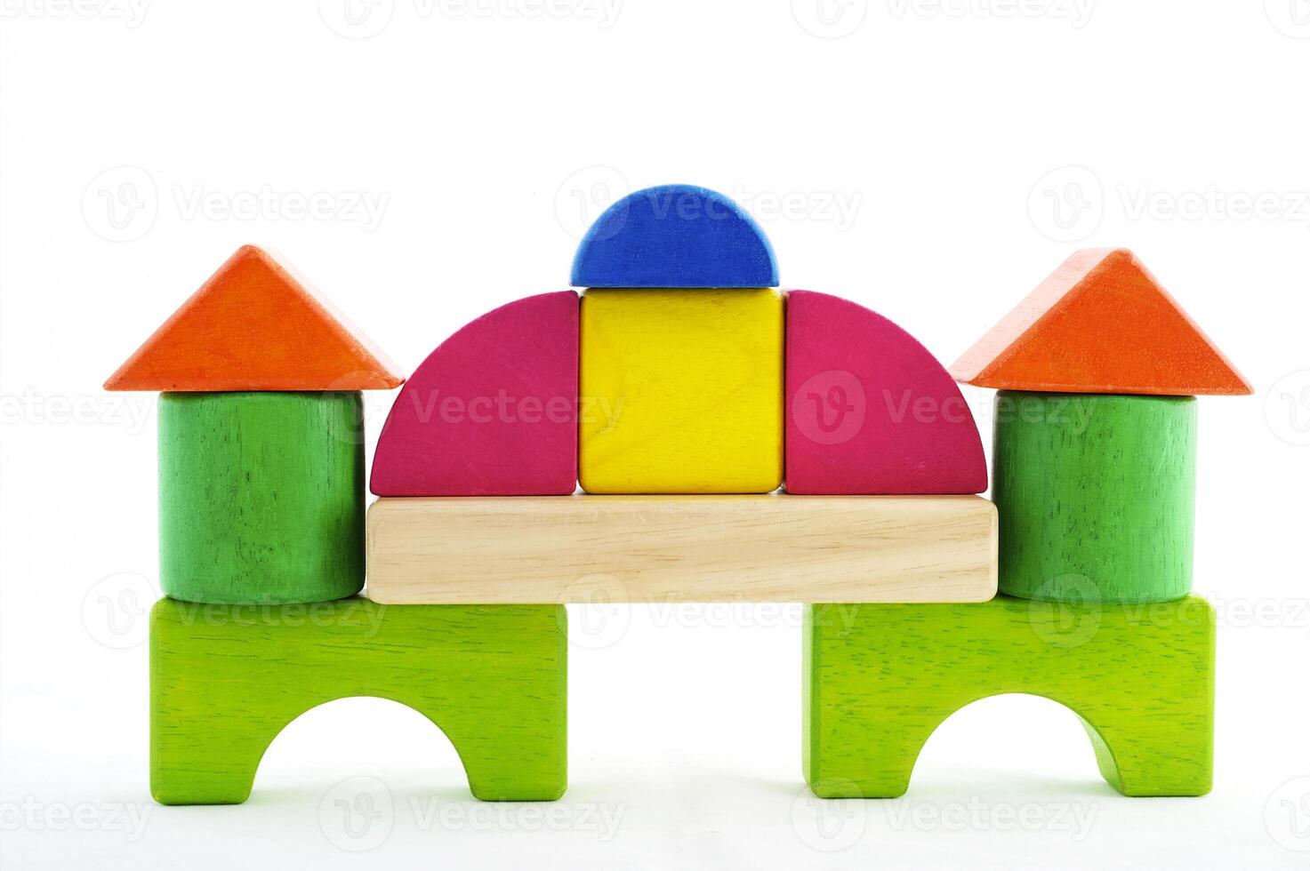Wooden toy blocks on white background photo