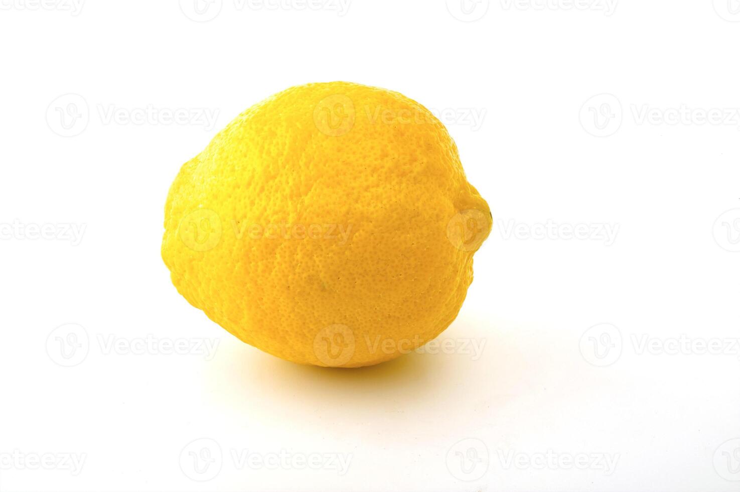 Ripe Lemon on the white background photo