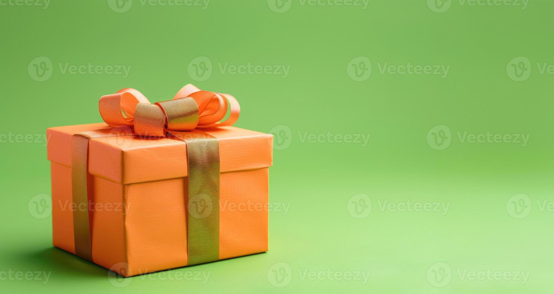 Banner with one big orange present box on solid light green background with place for text on right side. Happy Holidays or Shopping Sale concept. photo