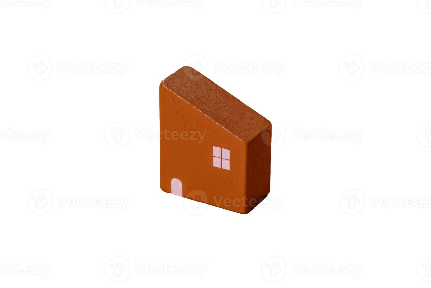 A small wooden house, money and keys as an idea for investing in your own home photo