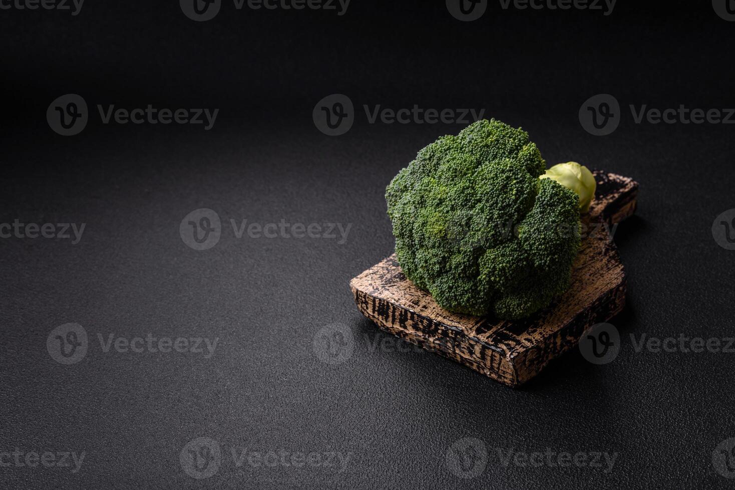 Fresh raw green broccoli in the form of a branch as an ingredient for cooking food at home photo
