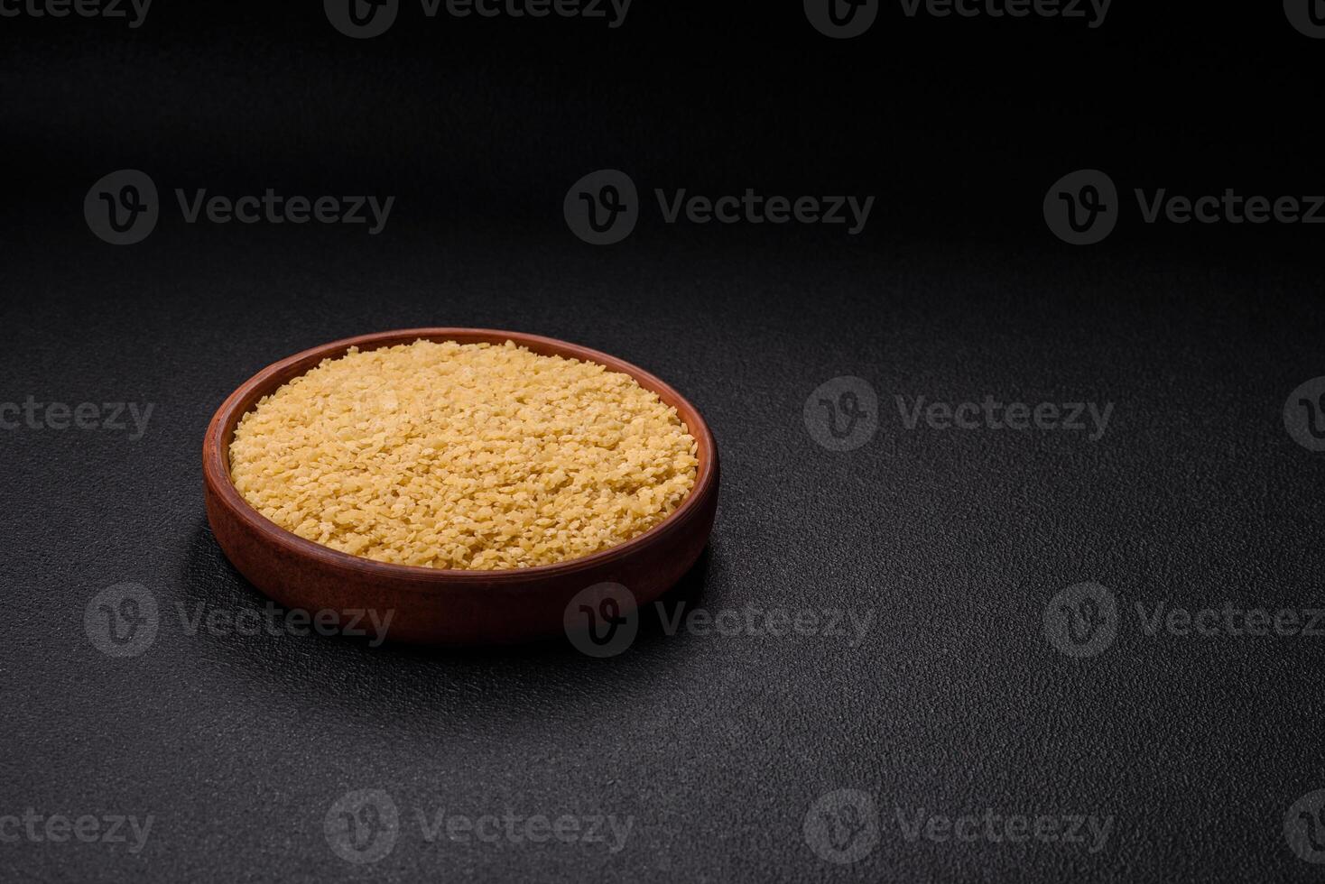 Raw stelline pasta from durum wheat with salt and spices photo