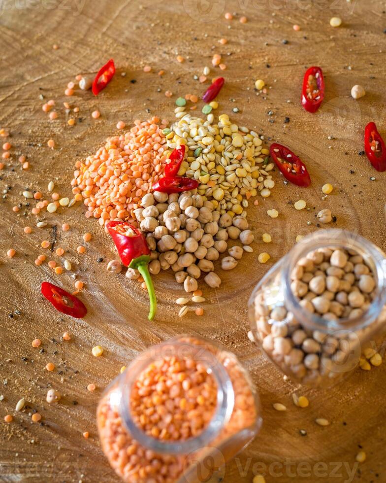 Raw cereals set on wooden background photo