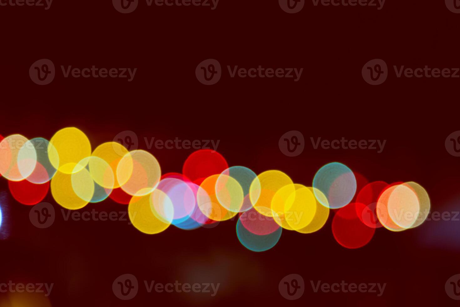 Color Bokeh against a dark photo