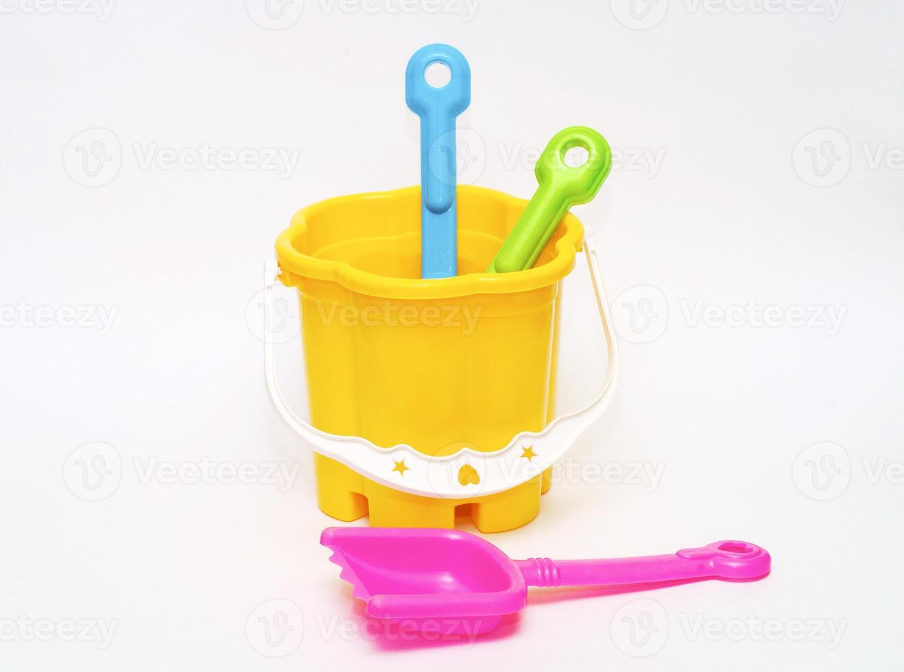 Colored toys for the game in the sand on the beach photo