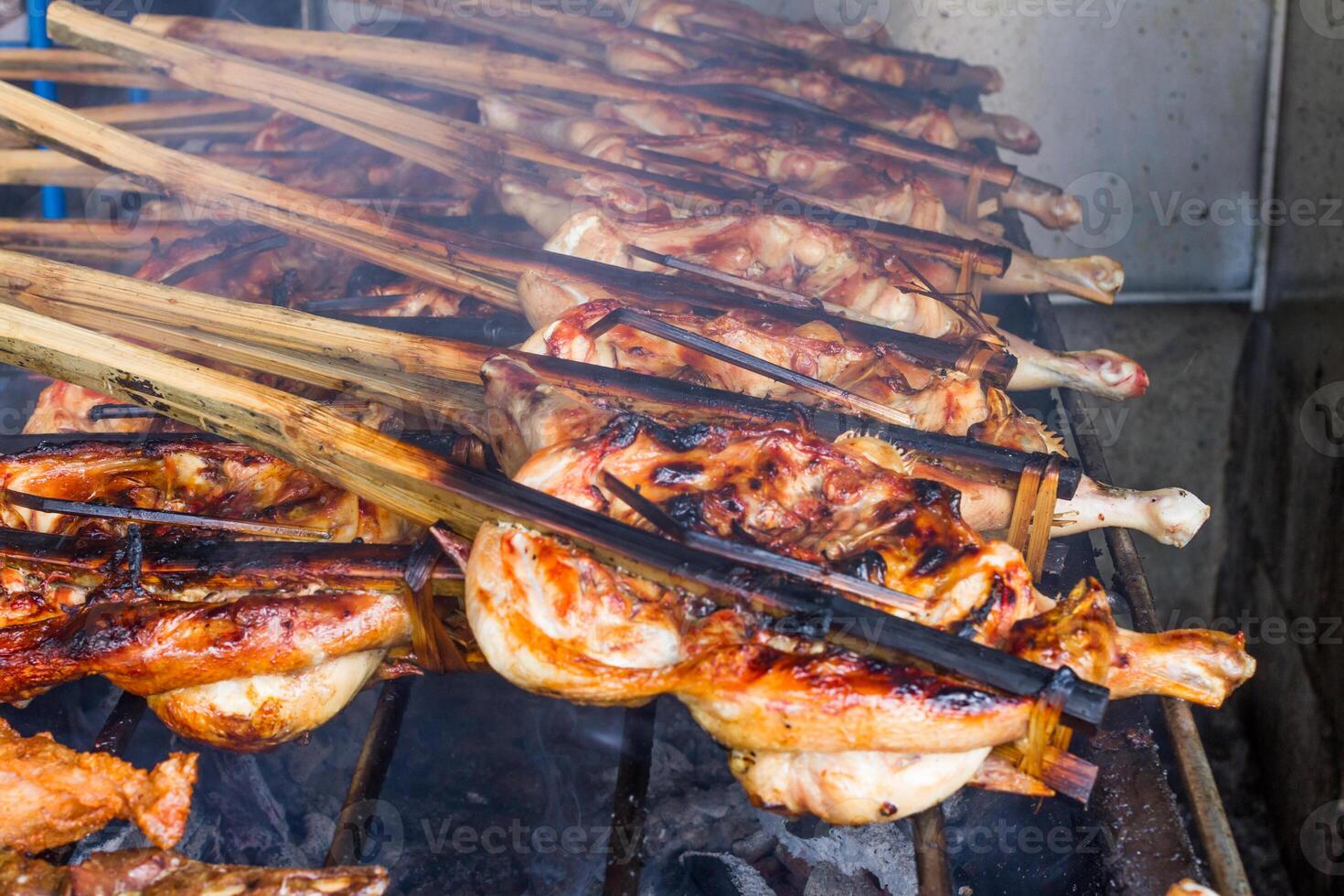 Grilled chicken on the grill photo
